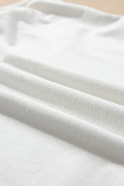 White sheer overlay tee and cami set fabric detail