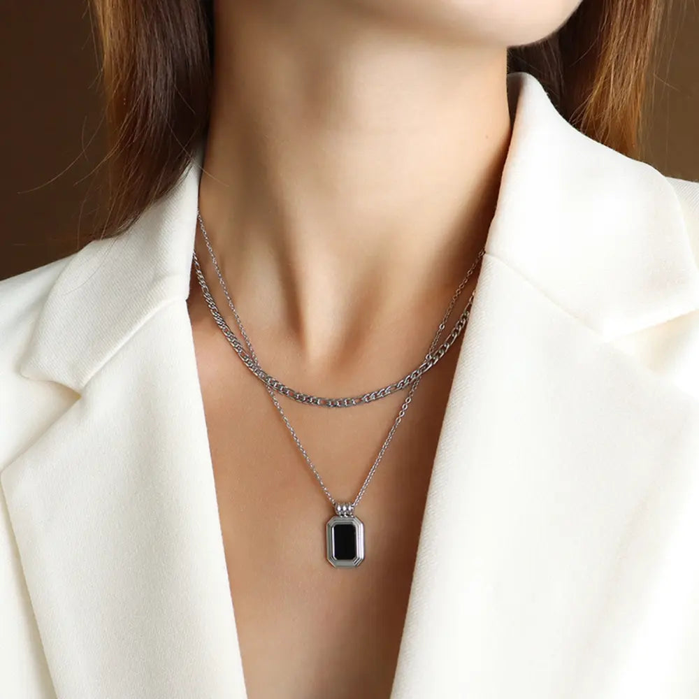 Silver double-layered necklace with rectangular onyx inset pendant