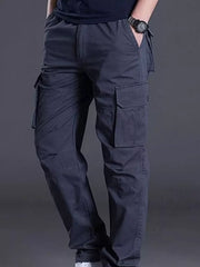 Men's dark gray relaxed fit cargo pants with multiple pockets.