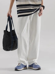 White relaxed fit cotton wide leg jeans with a casual, comfortable style.