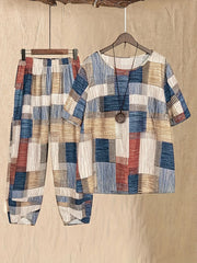 Women's patchwork print outfit set with half sleeve top and cropped pants in multicolor.