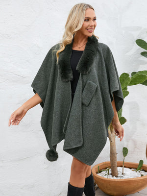 Dark green faux fur collar wrap poncho with pom-pom detail and pocket.