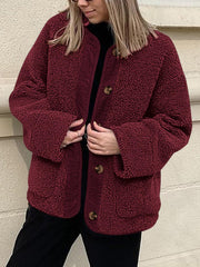 Burgundy teddy-texture button-up jacket with corduroy trim and button details.