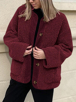 Burgundy teddy-texture button-up jacket with corduroy trim and button details.
