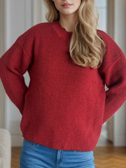 Textured ribbed knit oversized sweater in scarlet with a subtle shimmer, crew neck, long sleeves.