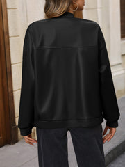 Black bomber jacket with a zip-up front and ribbed cuffs.