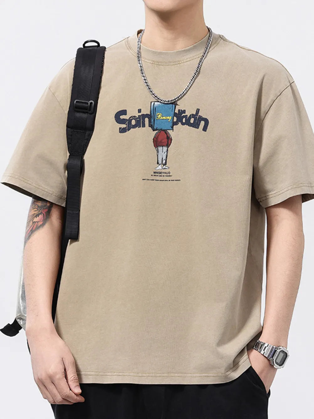 Khaki cotton graphic print t-shirt with relaxed fit and crew neck.