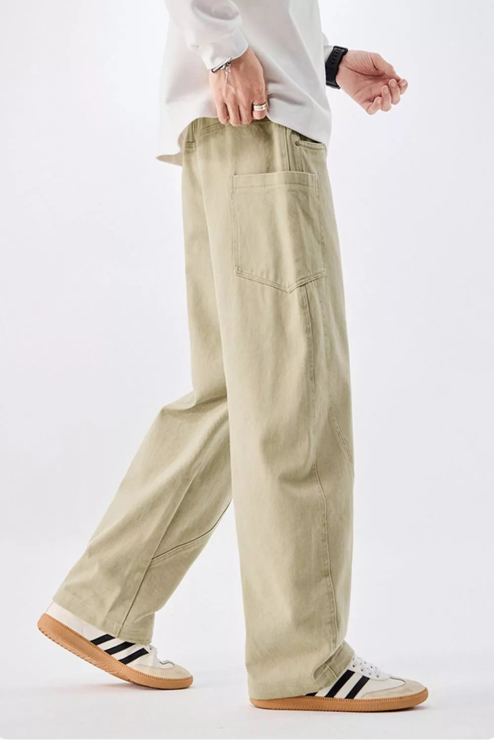 Men's relaxed fit cotton jeans in sage with drawstring waist and casual styling.
