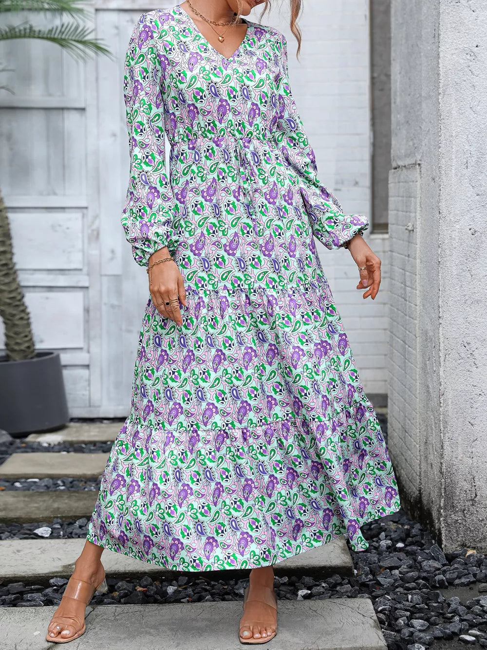 Vibrant paisley print midi dress with V-neck, balloon sleeves, and drawstring waist.