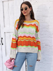 Rainbow wave crochet sweater with colorful stripes and open knit detail.