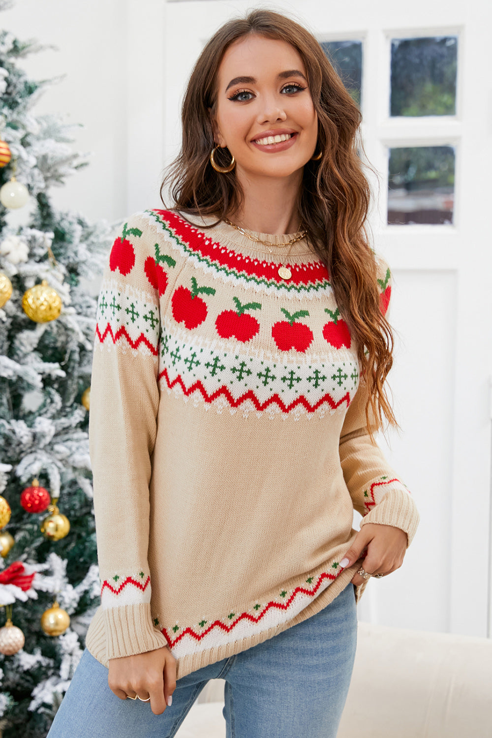 Tan acrylic sweater with festive apple motif Fair Isle pattern and red, green, white trim.