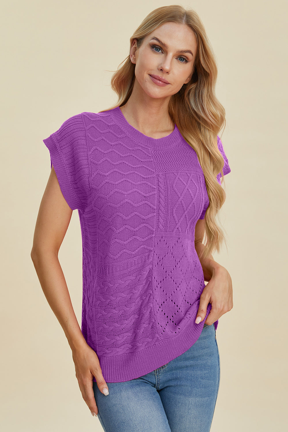 Purple knit patchwork top with cap sleeves and mixed stitch patterns.