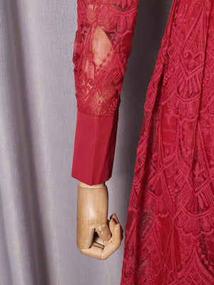 Red lace midi dress with button placket and long sleeves.