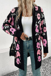 Black floral jacquard longline knit cardigan with ribbed trim and open front.