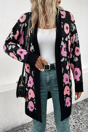 Black floral jacquard longline knit cardigan with ribbed trim and open front.