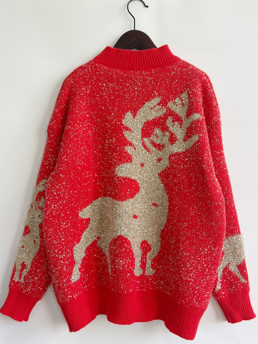 Red acrylic sweater with glittery reindeer pattern and mock neck.