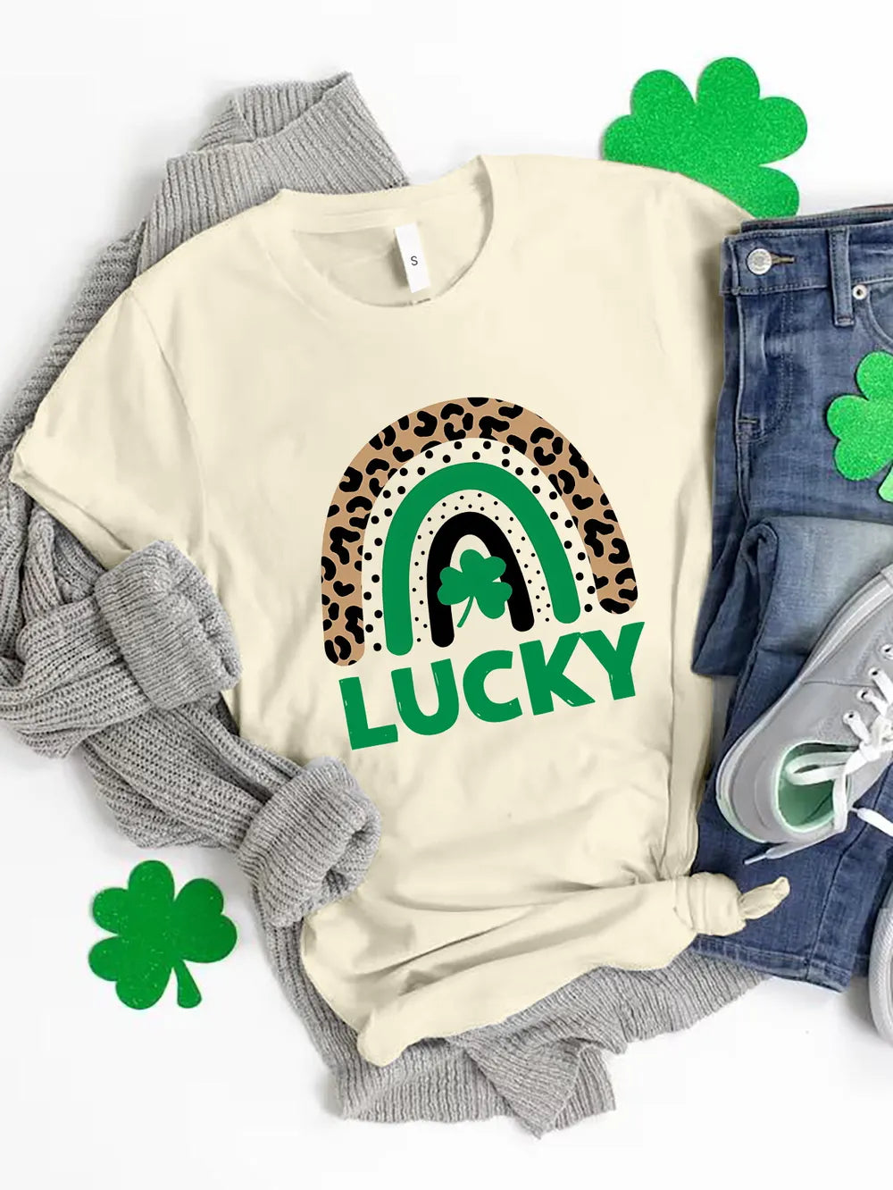 Cream graphic t-shirt with leopard print rainbow and lucky clover design