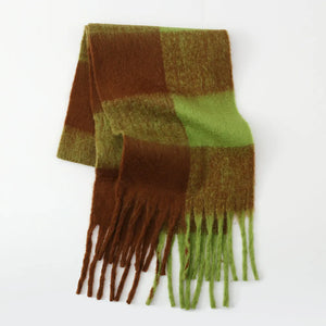 Checked plaid fluffy scarf in olive brown and green with fringe detail.