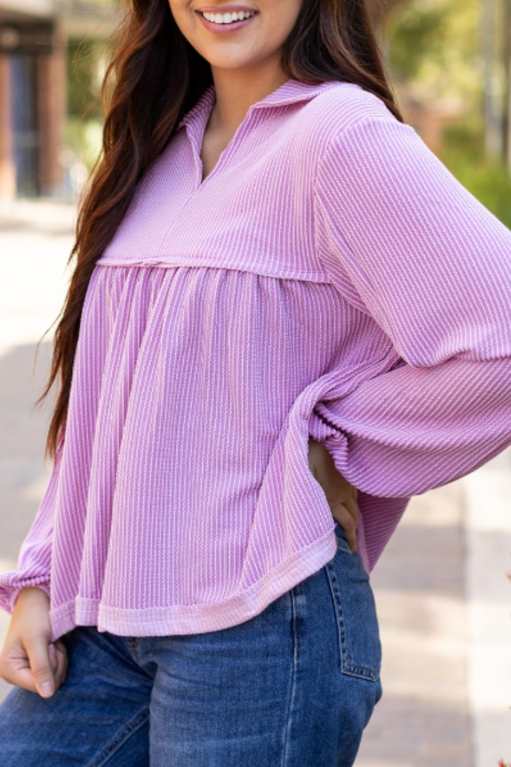 Lilac striped textured blouse with gathered yoke and collar, long sleeves.