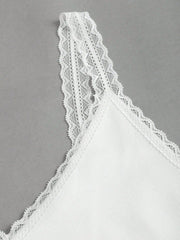White lace trim camisole with delicate lace straps and neckline detail.