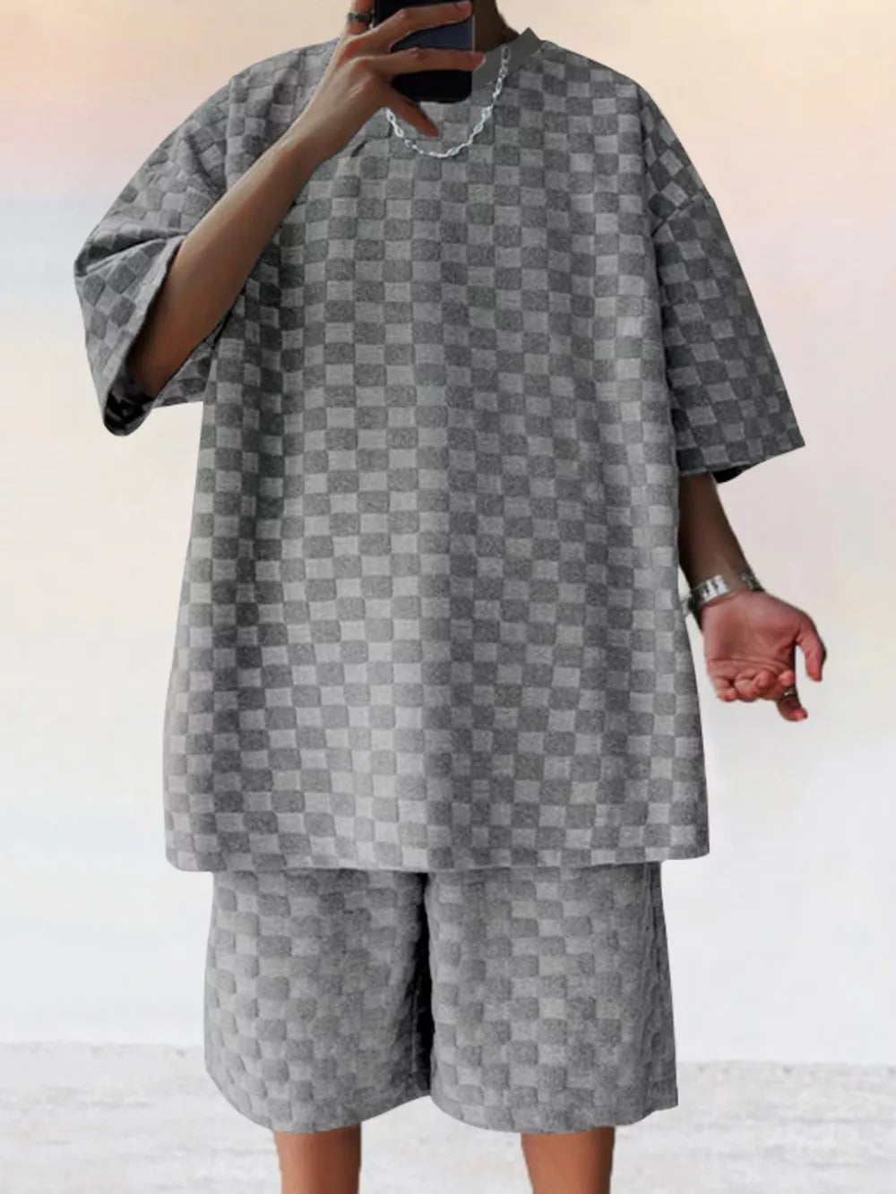 Textured dark gray checkered casual two-piece set for men.