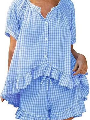 Blue gingham two-piece set with button-front top and ruffled shorts.
