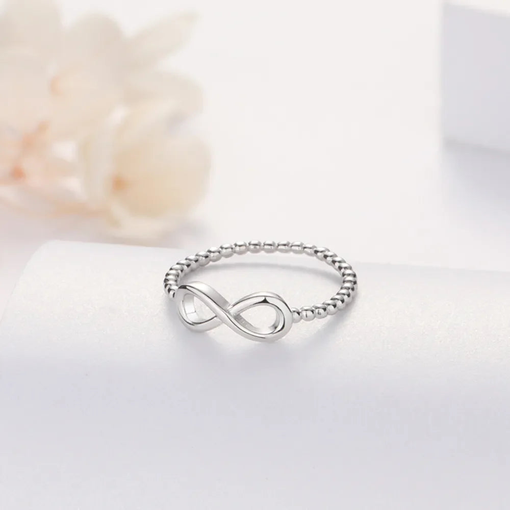 Sterling silver infinity ring with beaded band