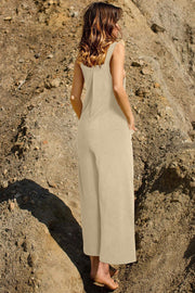 Tan corduroy overalls with wide legs and pockets, shown from the back.