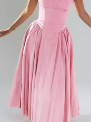 Blush pink sweetheart midi dress with spaghetti straps and full skirt