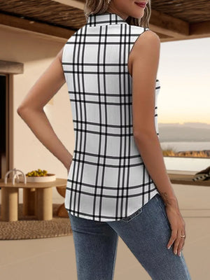Sleeveless white button-up blouse with black plaid pattern.
