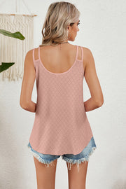 Blush pink cami with double straps and allover perforated detail.