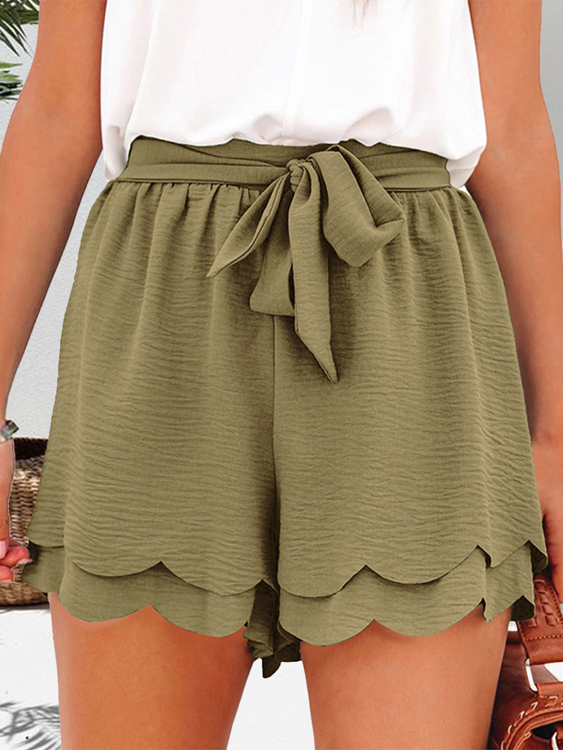 Moss green shorts with tie waist and scalloped hemline