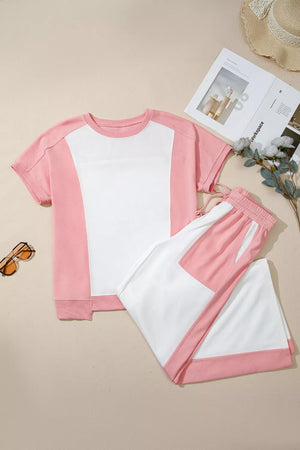 Color block cotton lounge set with crew neck tee and drawstring pants in pink and white.
