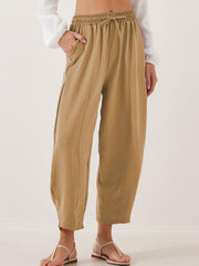 Camel balloon-leg drawstring trousers with seam detail and pockets