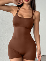 Brown cotton blend active romper with scoop neck and thin straps.