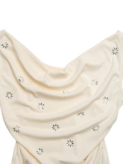 Cream cowl neck sleeveless bodysuit with starburst cutouts