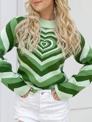 Light green knit sweater with mock neck and heart stripe pattern.