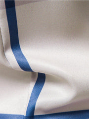 Men's blue and white striped cotton button-up shirt detail