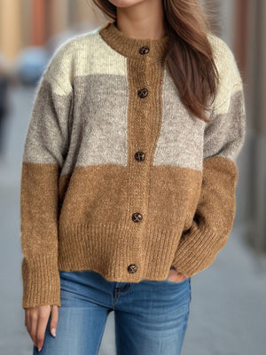 Colorblock crewneck button-down acrylic cardigan in beige, caramel, and gray stripes.