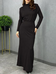 Black mock neck maxi dress with long sleeves and defined waist