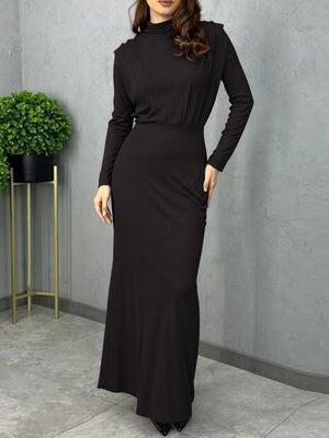 Black mock neck maxi dress with long sleeves and defined waist