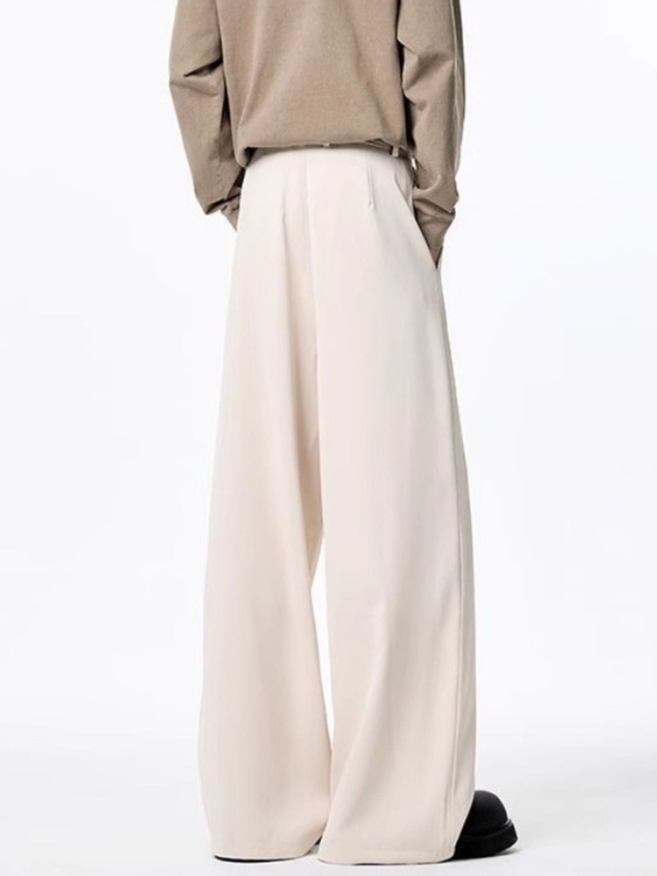 Men's plus-size apricot wide-leg casual pants with a belted waist.