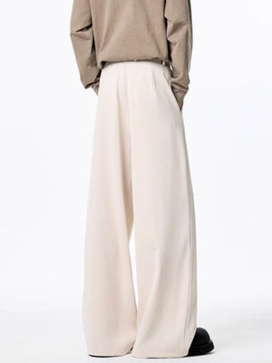 Men's plus-size apricot wide-leg casual pants with a belted waist.