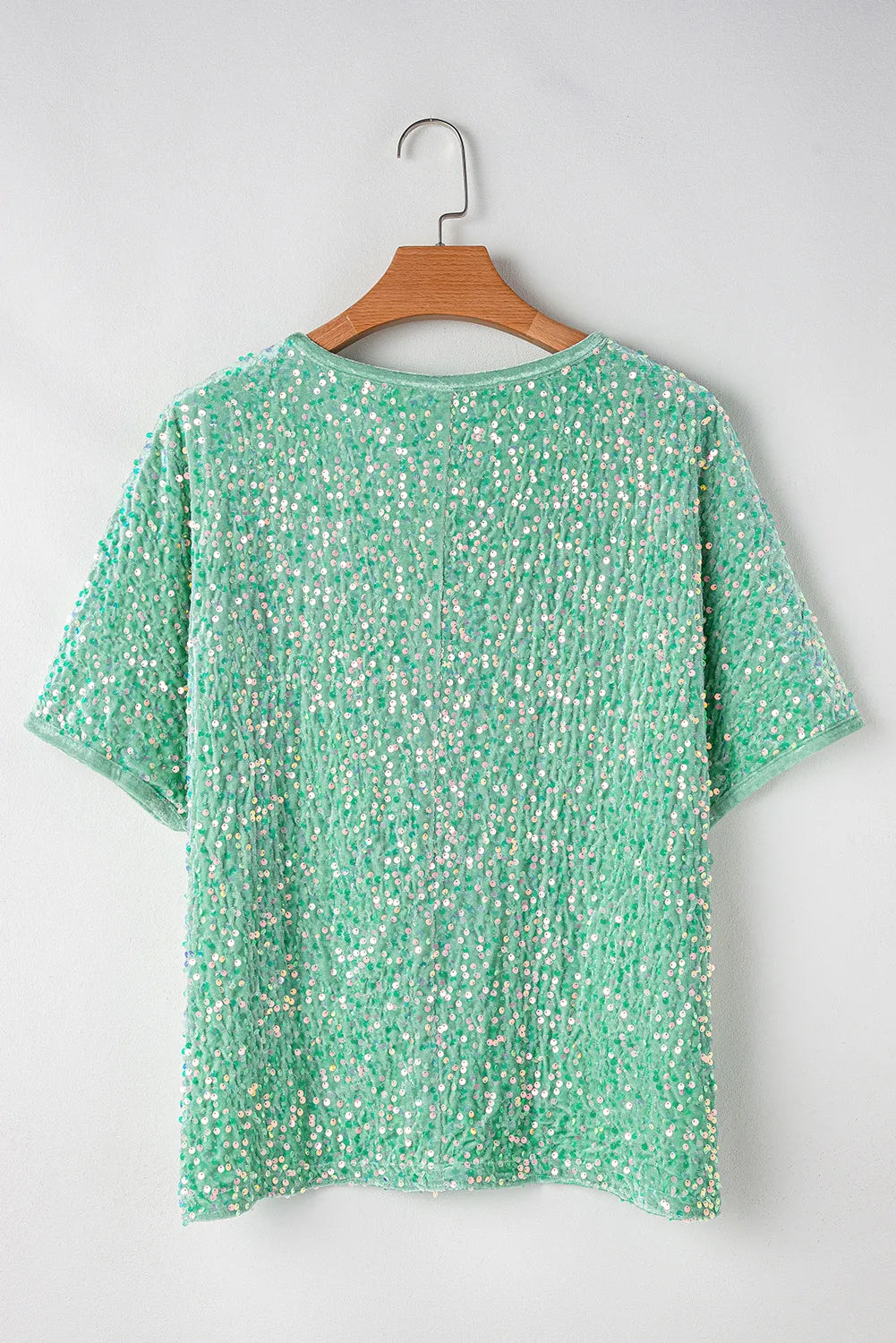 Sequin embellished dolman sleeve top in Gum Leaf green with short sleeves.