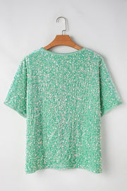 Sequin embellished dolman sleeve top in Gum Leaf green with short sleeves.