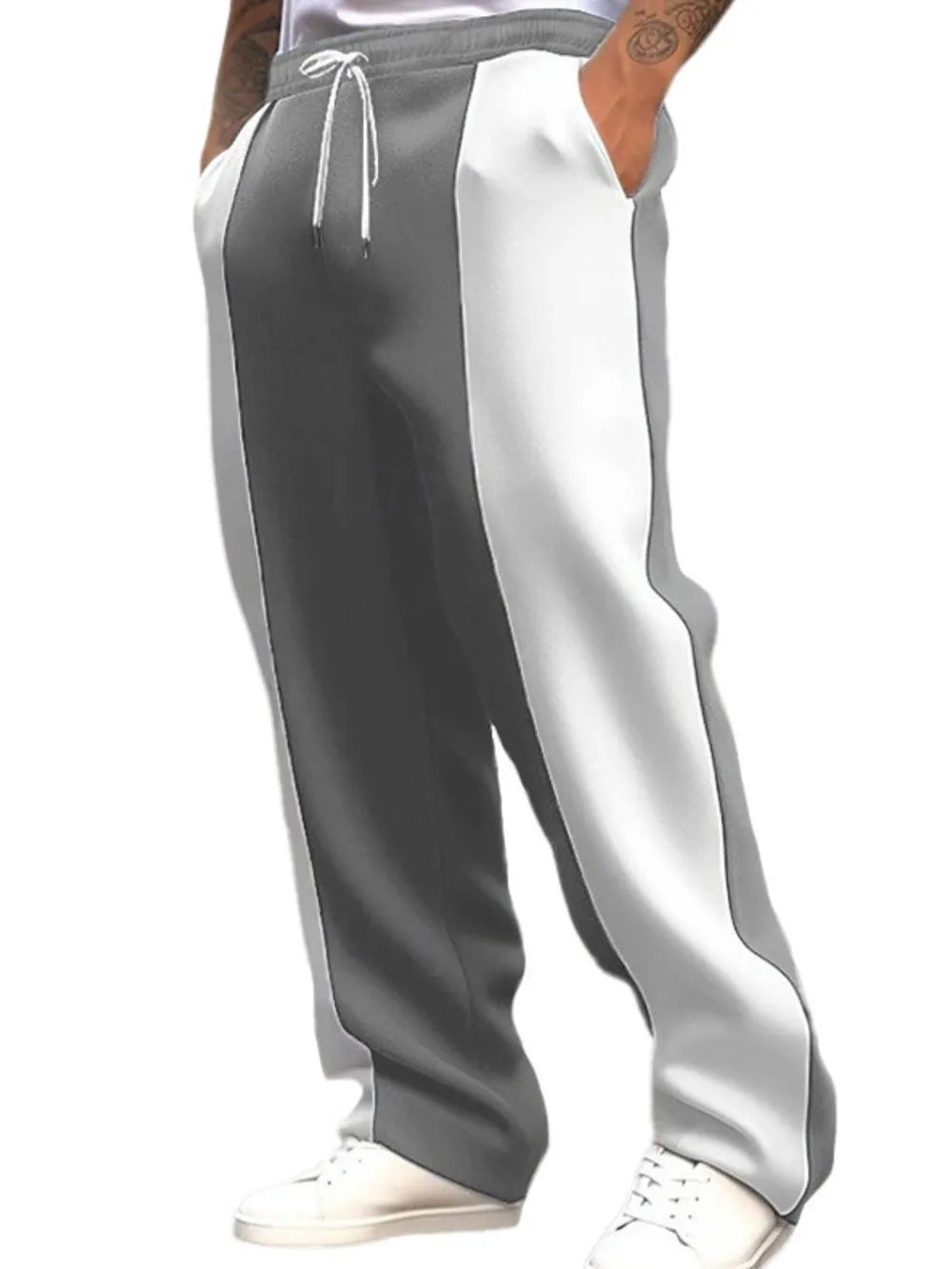 Panelled track pants in gray and white with drawstring waist and pockets.