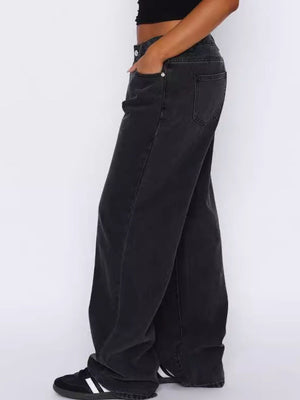 Wide-leg dark gray denim jeans with contrast stitching and a buttoned fly.