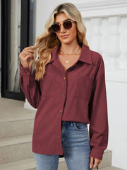 Burgundy corduroy overshirt with button front and chest pockets.