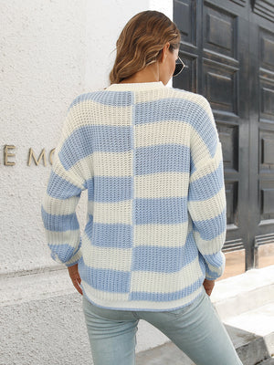 Misty Blue and white striped acrylic sweater with a checkerboard pattern detail.