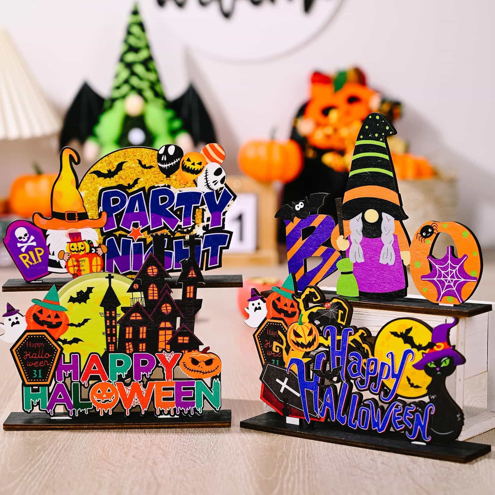 Spooky Scene Halloween tabletop decorations with gnomes, pumpkins, and "Happy Halloween" text.